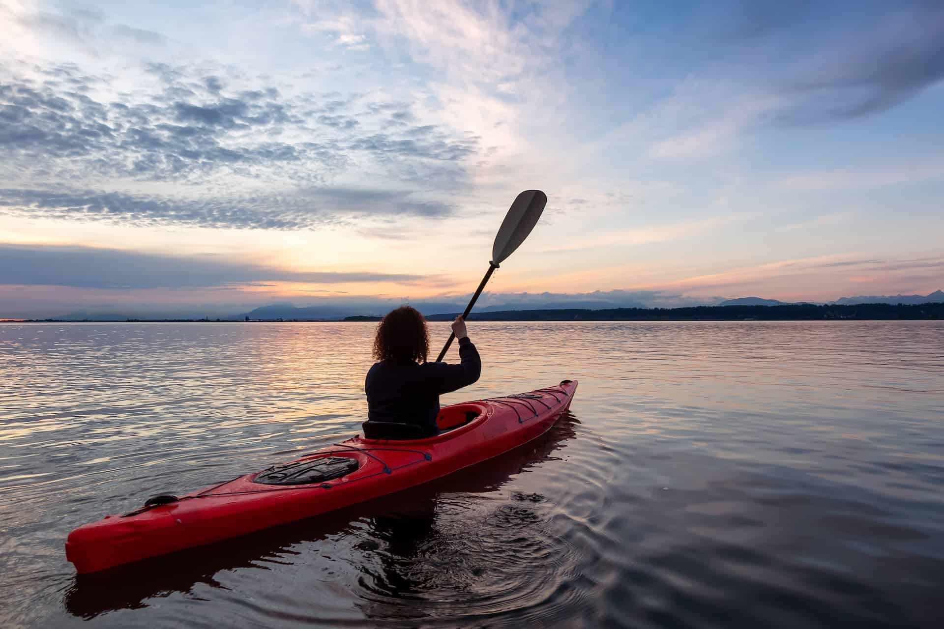 Deportista en un Kayak en Puerto de POllensa