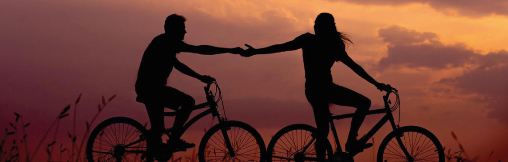 Couple spending a romantic sunset on the beach