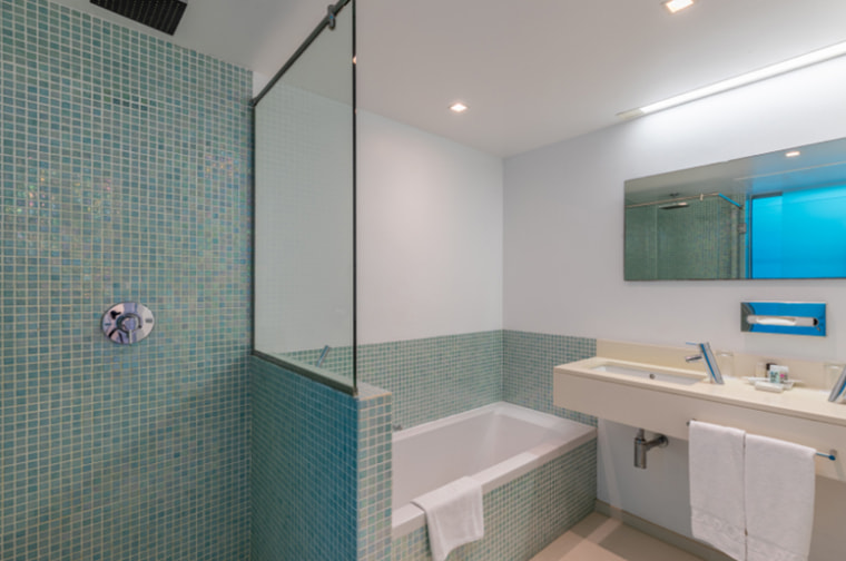 Full bathroom with bathtub and shower