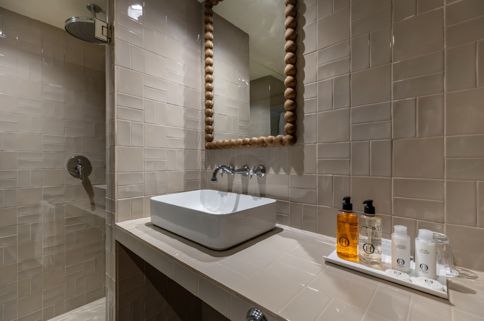 Bathroom with shower and countertop sink.