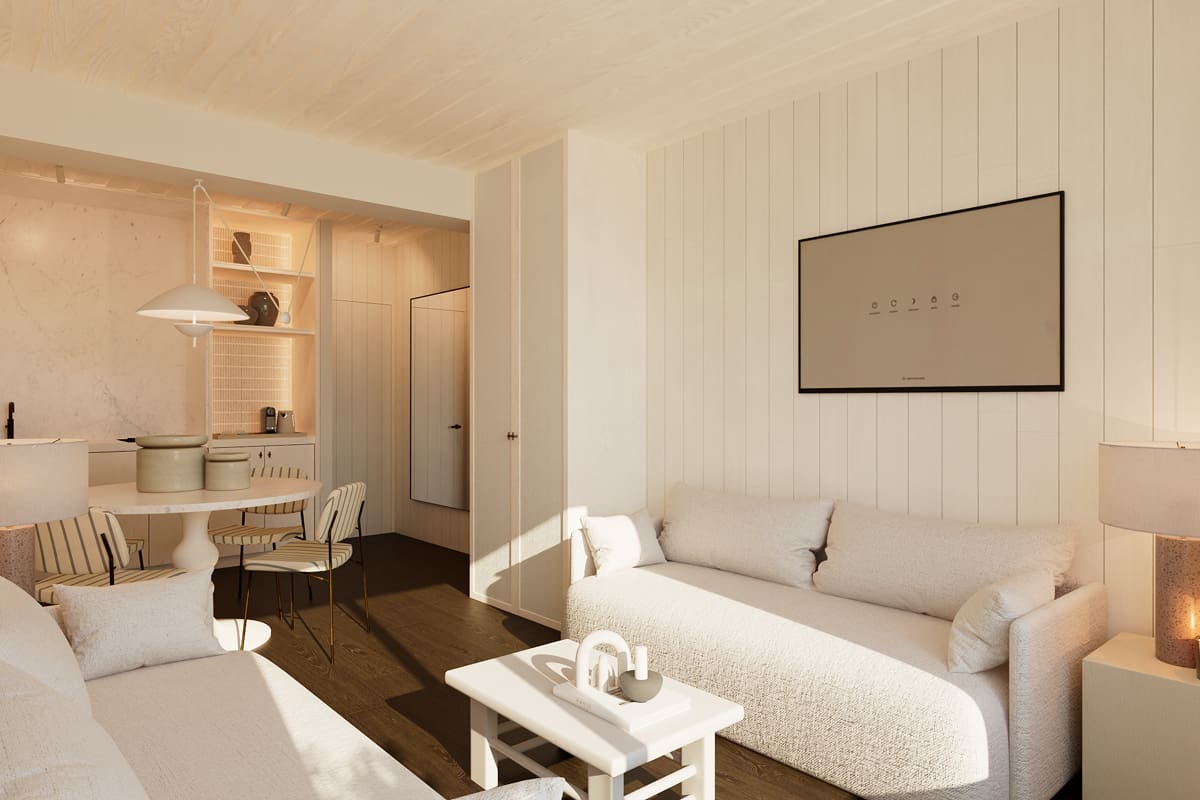 Wohnbereich mit zwei Sofas und Couchtisch im Apartment