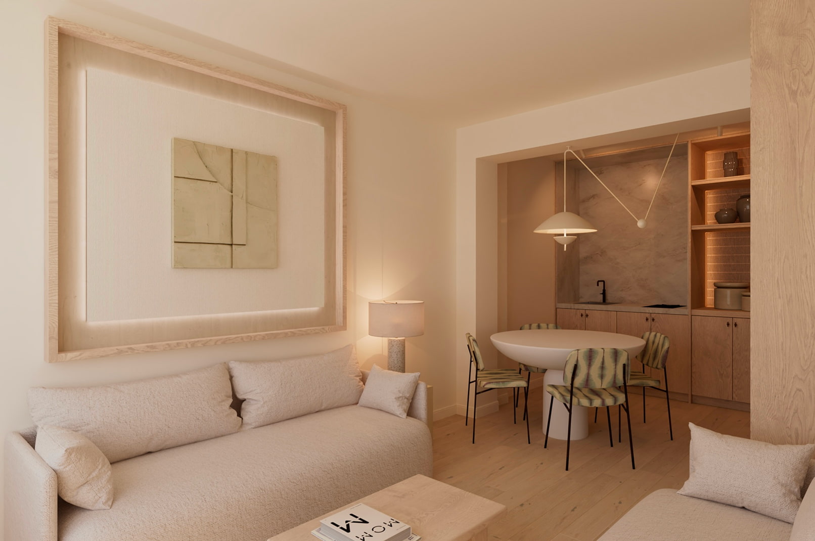 Zona de estar con cocina integrada del apartamento premium