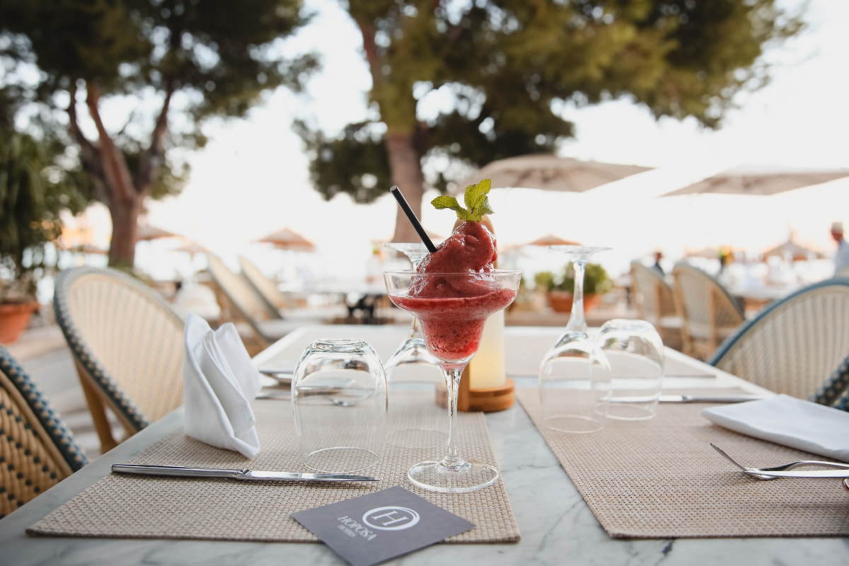 Glass of ice cream in front of the beach in Puerto Pollensa